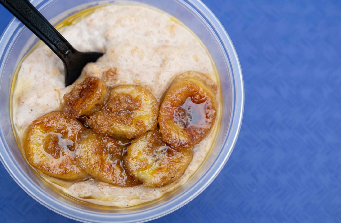 A creamy Jamaican porridge topped with golden caramelized banana slices