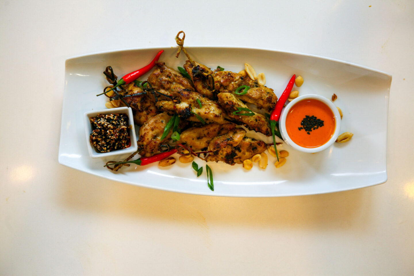 chicken skewers on a plate