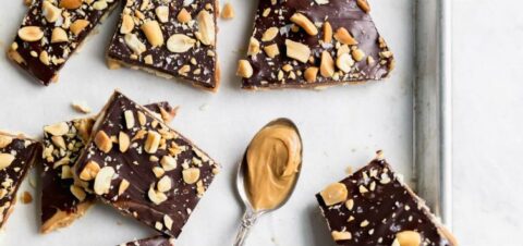 crackers drizzled in chocolate and peanuts.