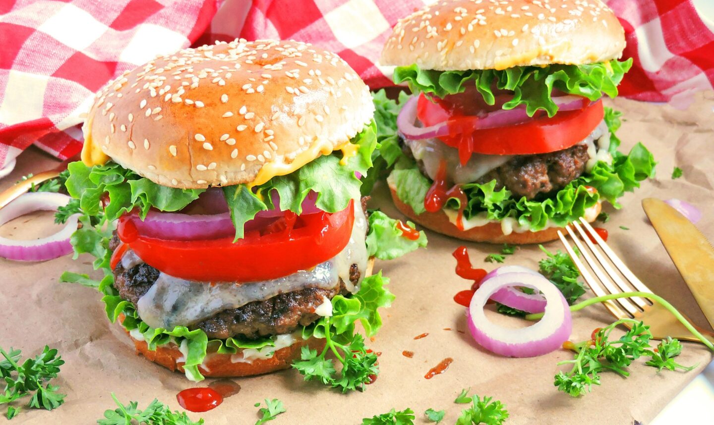 a tall burger with meat